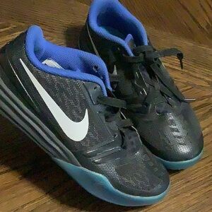 Nike Kids Black Sneakers with Blue Accents